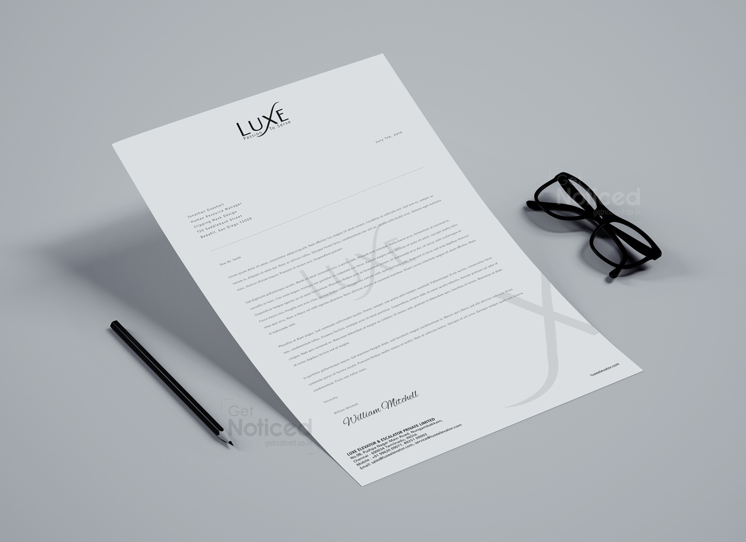 Luxe Elevators letterhead and envelope layout in brand colors